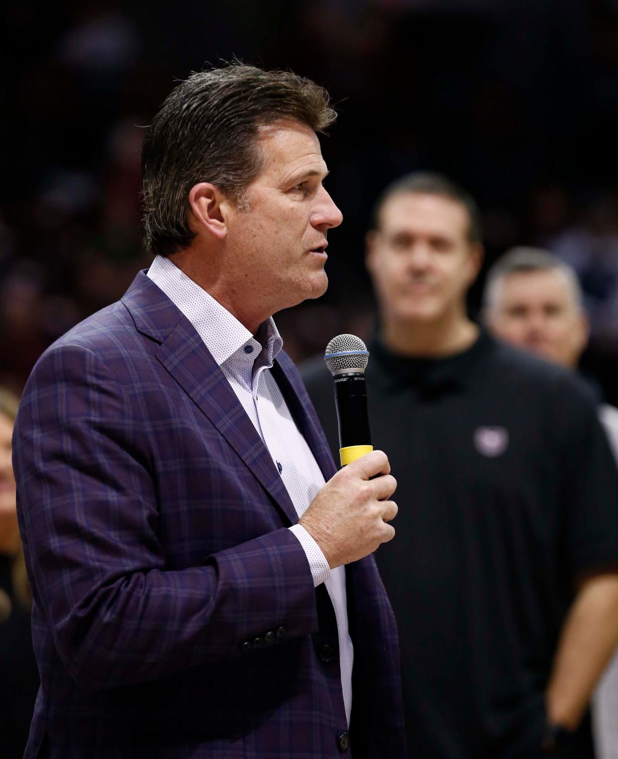 Former head coach, Steve Alford, of the 1999 Sweet 16 SMS Bears speaks prior to Danny Moore's jersey being retired at the Missouri State game against visiting South Carolina State at Great Southern Arena in Springfield on November 25, 2023.