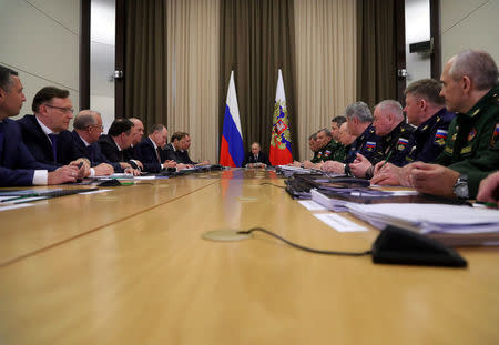 Russian President Vladimir Putin chairs a meeting with Defense Ministry top officials and defence industry representatives in Sochi, Russia May 17, 2017. Sputnik/Mikhail Klimentyev/Kremlin via REUTERS