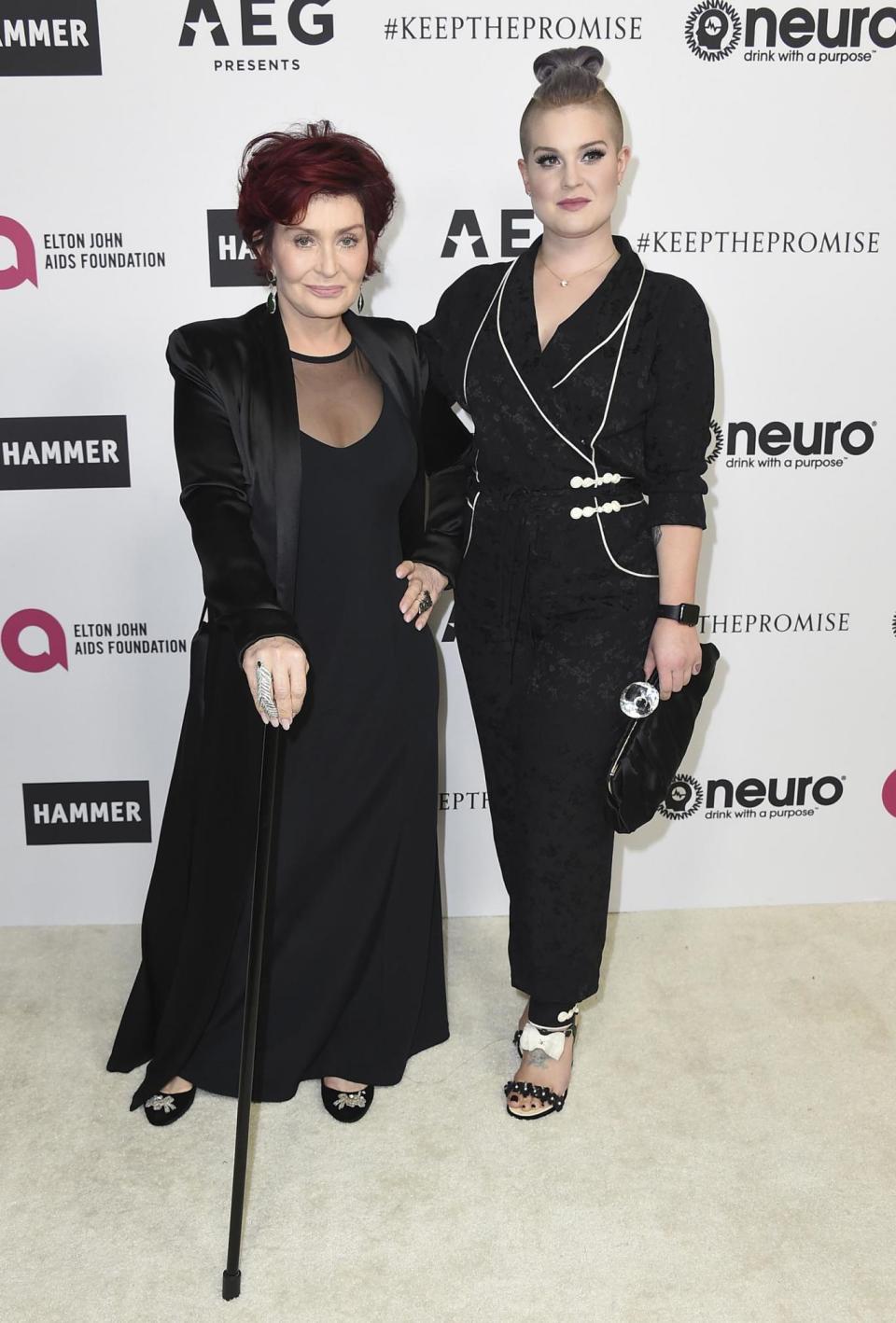 Sharon and Kelly Osbourne arrive at the Rocket Man star's birthday bash that raised funds for Elton John Aids Foundation (Jordan Strauss/Invision/AP)