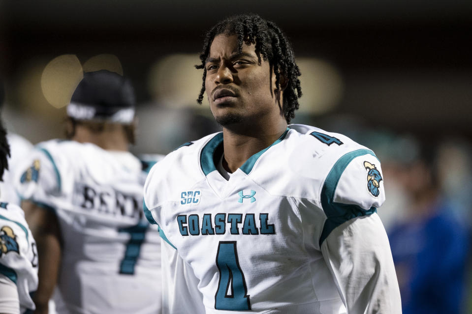 Coastal Carolina tight end Isaiah Likely (4) watches from the sideline during the first half of the team's NCAA college football game against Appalachian State on Thursday, Oct. 21, 2021, in Boone, N.C. (AP Photo/Matt Kelley)