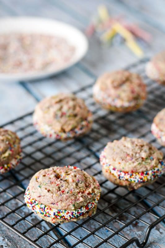 <p>unsophisticook.com</p><p>Multicolored sprinkles give these birthday cake cookie sandwiches a fun and festive touch… They taste just like birthday cake and are super easy to make! </p><p><strong>Get the recipe:</strong> <a href="http://unsophisticook.com/birthday-cake-cookies/" rel="nofollow noopener" target="_blank" data-ylk="slk:Funfetti Birthday Cake Cookies;elm:context_link;itc:0;sec:content-canvas" class="link "><strong>Funfetti Birthday Cake Cookies</strong></a></p>