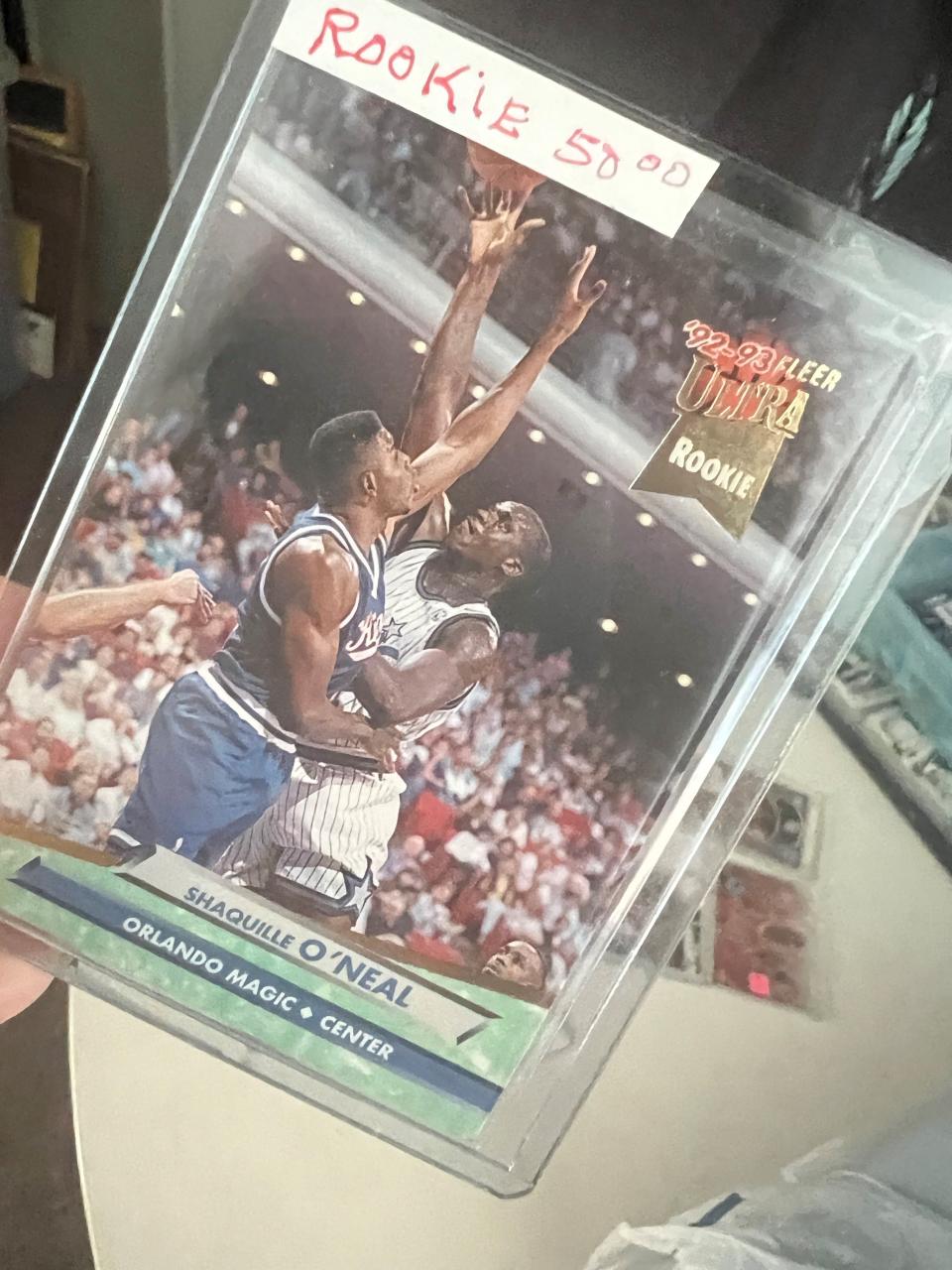 William Squire paid $50 for this Shaquille O'Neal rookie trading card. Squire collected about 88,500 trading cards over four decades. After his death, his collection was donated to the Center for Active Adults in South Lyon, which is now preparing to sell the cards in a closed bid auction.