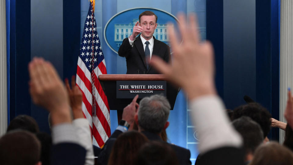 National security adviser Jake Sullivan responds as reporters raise their hands to ask questions during a briefing at the White House.