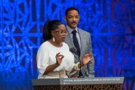 Oprah Winfrey and Will Smith attend the opening ceremony for the Smithsonian National Museum of African American History and Culture in Washington on September 24, 2016