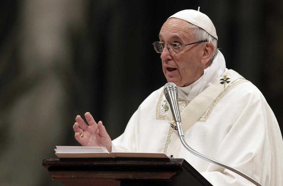 Pope Francis presides over a solemn Easter vigil ceremony in St. Peter's Basilica at the Vatican, Saturday, April 15, 2017. (AP Photo/Andrew Medichini)