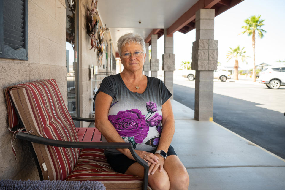 Judy Youngs worries about the rent increases she and her neighbors are facing at Coyote Ranch in Yuma, Ariz. Youngs, who voted for Donald Trump in 2016 and 2020 is unsure of who she will vote for in 2024, expressing frustration with both Trump and President Biden. (Caitlin O'Hara for The Washington Post)