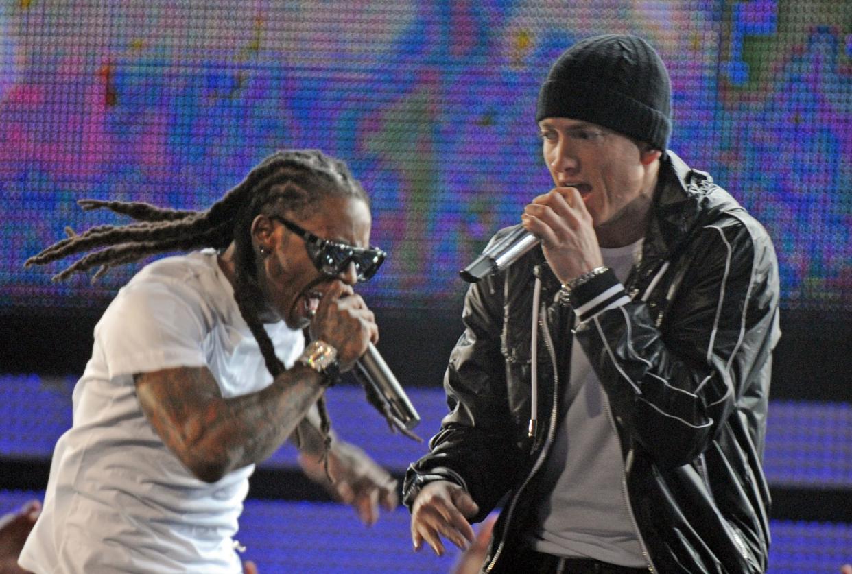 Lil Wayne (L) and Eminem perform during the Grammy Show at the 52nd Grammy Awards in Los Angeles, California on January 31, 2010.