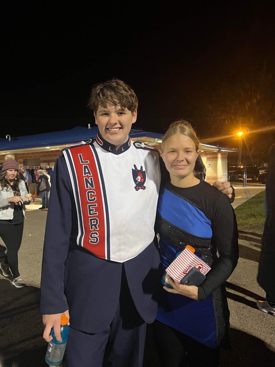 Gavin Smith (left) is pictured in his Lakewood Lancer Marching Band uniform.