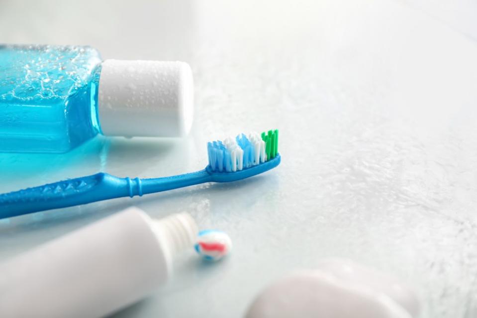 “When you rinse, you are basically rinsing away the active ingredients of the toothpaste that you just put on your teeth,” one dentist said. Pixel-Shot – stock.adobe.com