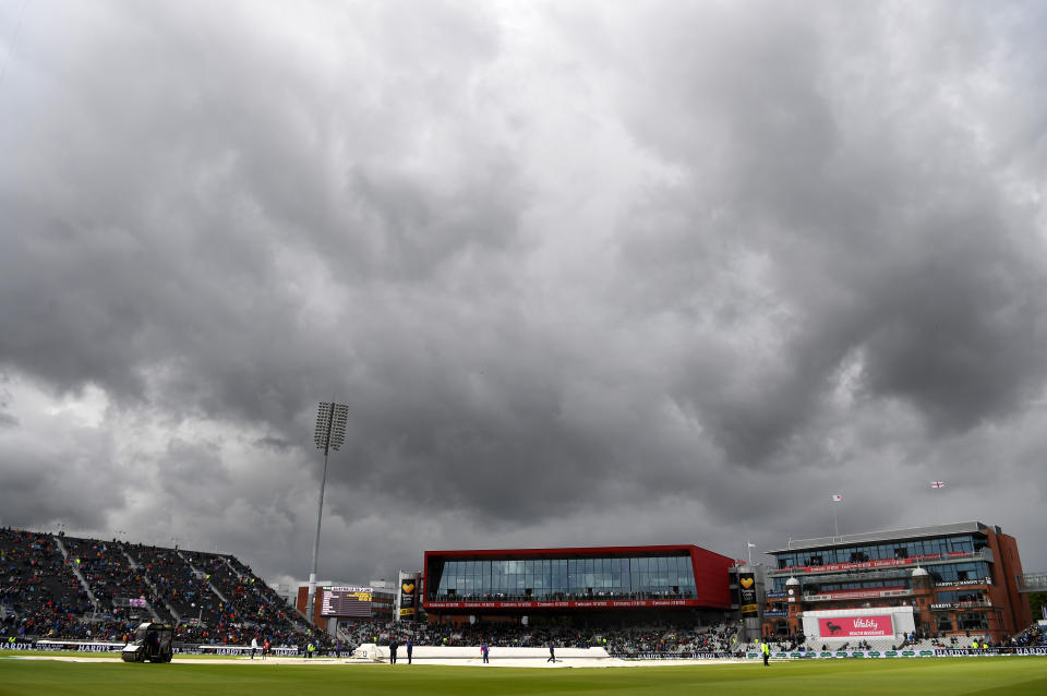 MANCHESTER, ENGLAND - SEPTEMBER 04:  A general view of Old Trafford as the grounds staff attempts to clear the covers of water during Day One of the 4th Specsavers Ashes Test between England and Australia at Old Trafford on September 04, 2019 in Manchester, England. (Photo by Alex Davidson/Getty Images)