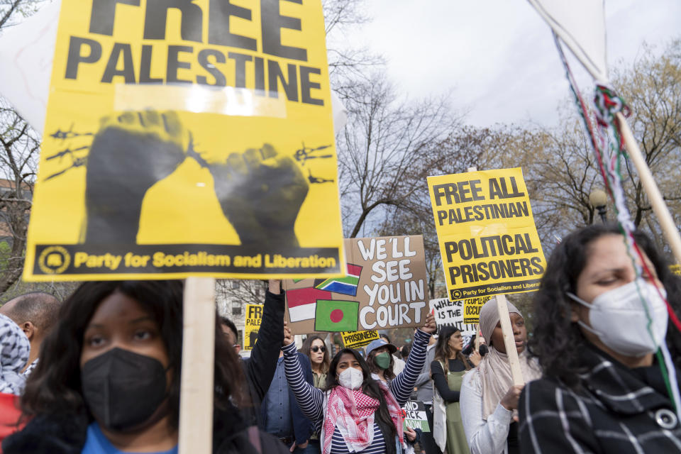 Protesters demonstrate in support of Palestinians at Dupont Circle in Washington, Saturday, March 30, 2024. (AP Photo/Jose Luis Magana)