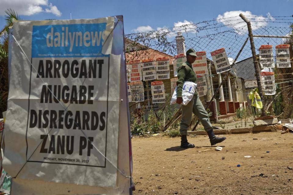 A news stand in Harare, Zimbabwe, shows headlines dominated by the country's political crisis. (AP)