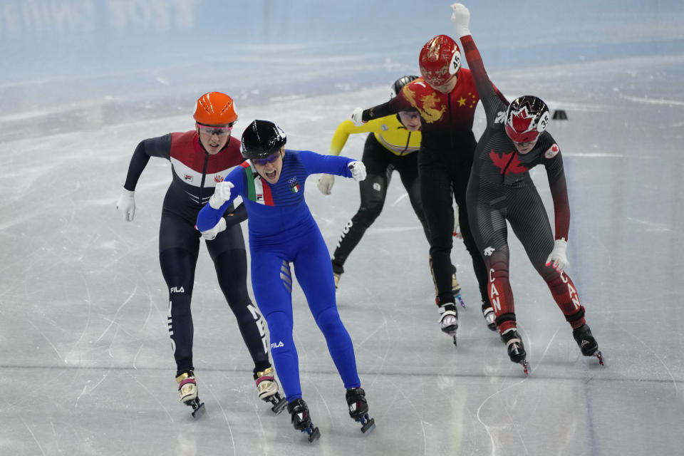 Arianna Fontana of Italy, celebrates after winning the final of the women's 500-meter during the short track speedskating competition at the 2022 Winter Olympics, Monday, Feb. 7, 2022, in Beijing. (AP Photo/Natacha Pisarenko)