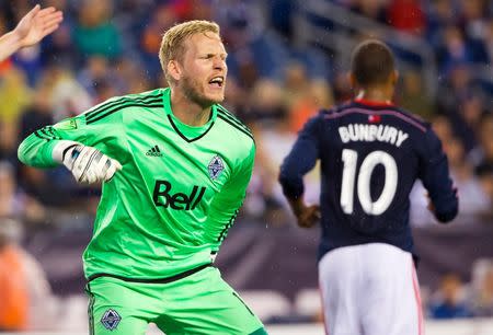 Jun 27, 2015; Foxborough, MA, USA; Vancouver FC goalkeeper David Ousted (1) celebrates making a save during the second half of Vancouver FC's 2-1 win over the New England Revolution at Gillette Stadium. Mandatory Credit: Winslow Townson-USA TODAY Sports