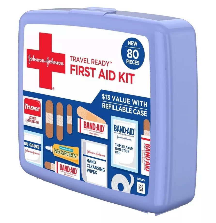 Angled photo of light purple first aid kit showing all the contents inside