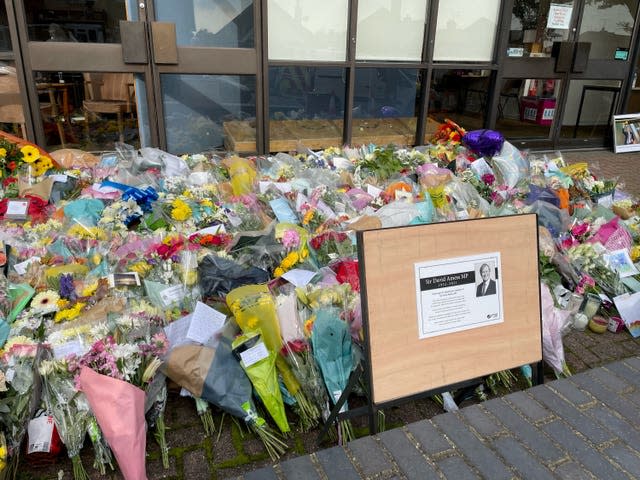 A sign placed next to the floral tributes left outside the Belfairs Methodist Church in Leigh-on-Sea, Essex (Sam Russell/PA)