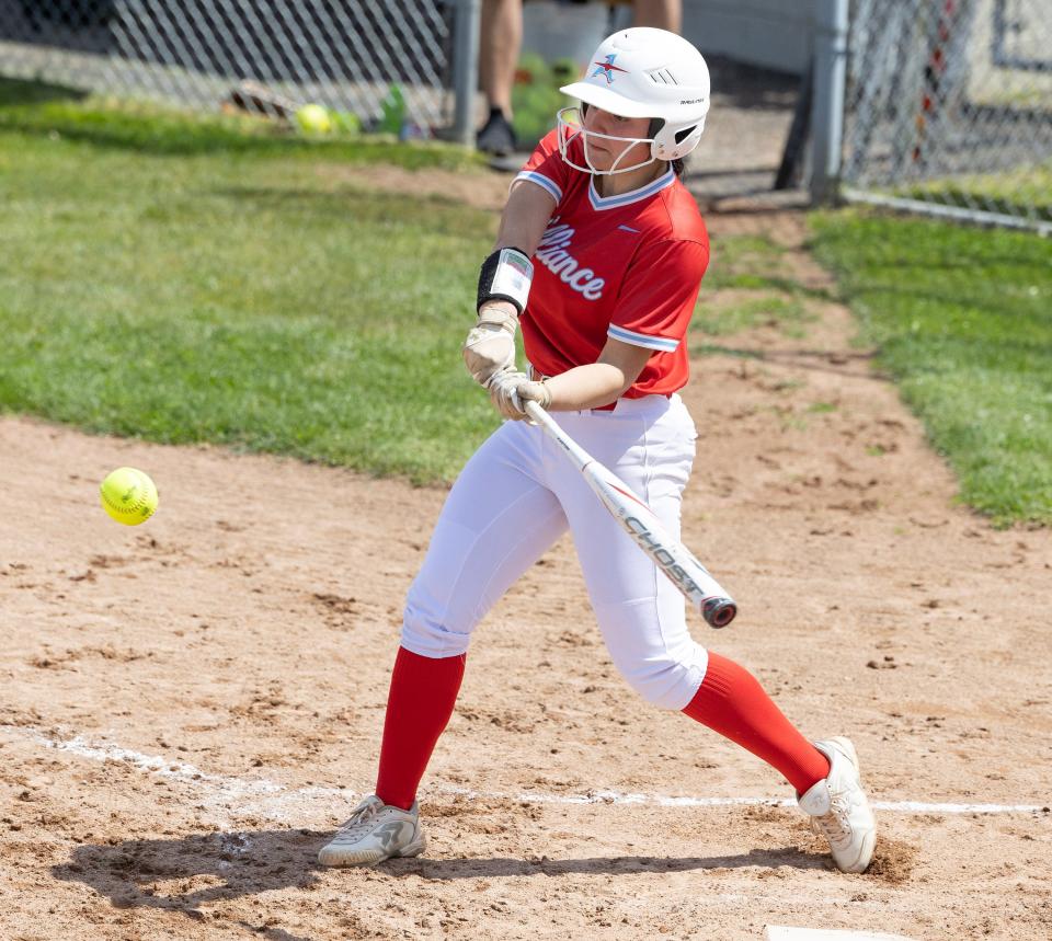 Alliance's Emma Reese takes a cut during their game at Massillon Saturday, May 6, 2023. 