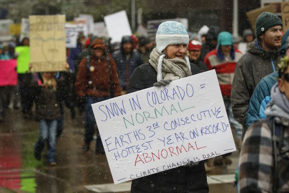 Protestors march around downtown Denver at the People's Climate March on April 29, 2017.