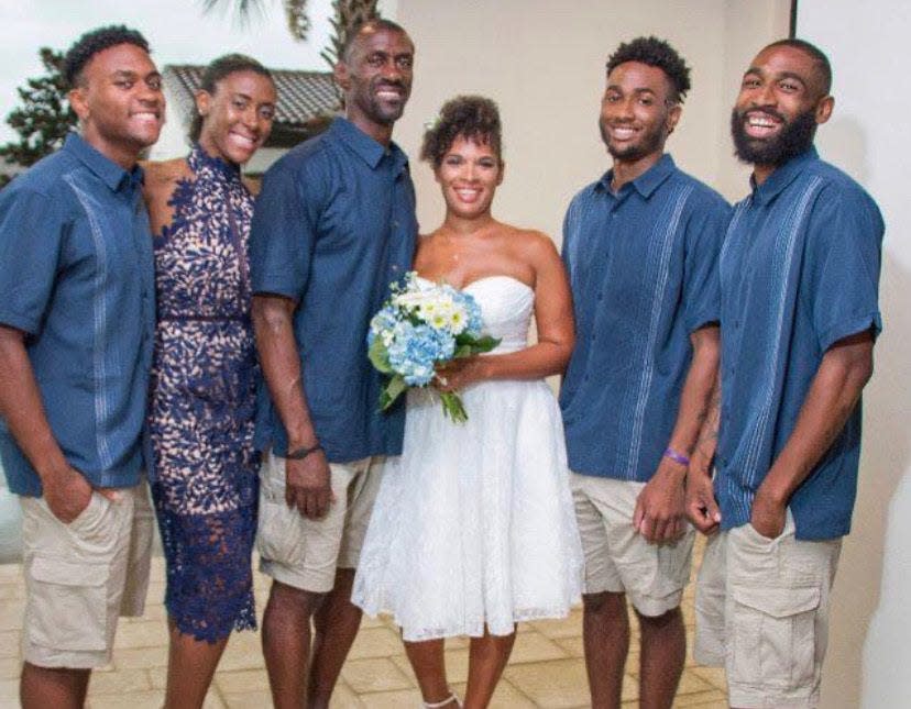 Former NFL strength and conditioning coach Markus Paul and Heidi celebrating their marriage with their children, left to right: Jairus Paul, Tabitha Paul, Mathias Smith and Dwayne Smith.