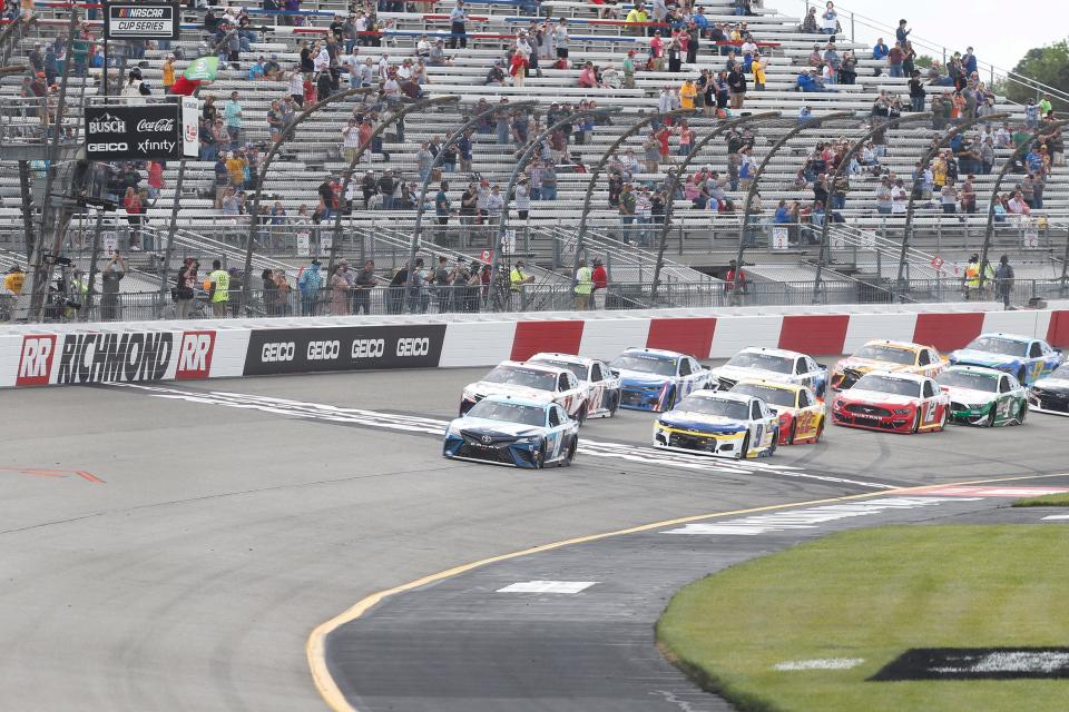 Martin Truex Jr. leads the field across the start/finish line at Richmond Raceway on April 18, 2021.