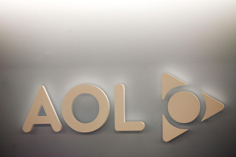 FILE - The AOL logo is shown on a wall of the company's New York office, in this Monday, May 12, 2008, file photo. Verizon is selling the segment of its business that includes Yahoo and AOL to private equity firm Apollo Global Management in a $5 billion deal. Verizon said Monday, May 3, 2021, that it will keep a 10% stake in the new company, which will be called Yahoo. (AP Photo/Mark Lennihan, File)