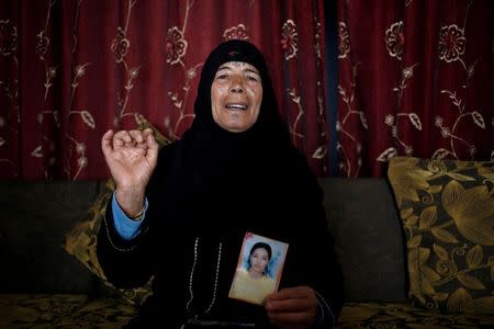 Chahla, 66, mother of Wahida, who was married to a militant killed in an air strike and is now being held with her son in a prison in Tripoli, speaks during a meeting with Reuters at their house in El Kef, Tunisia June 1, 2016. REUTERS/ Zohra Bensemra