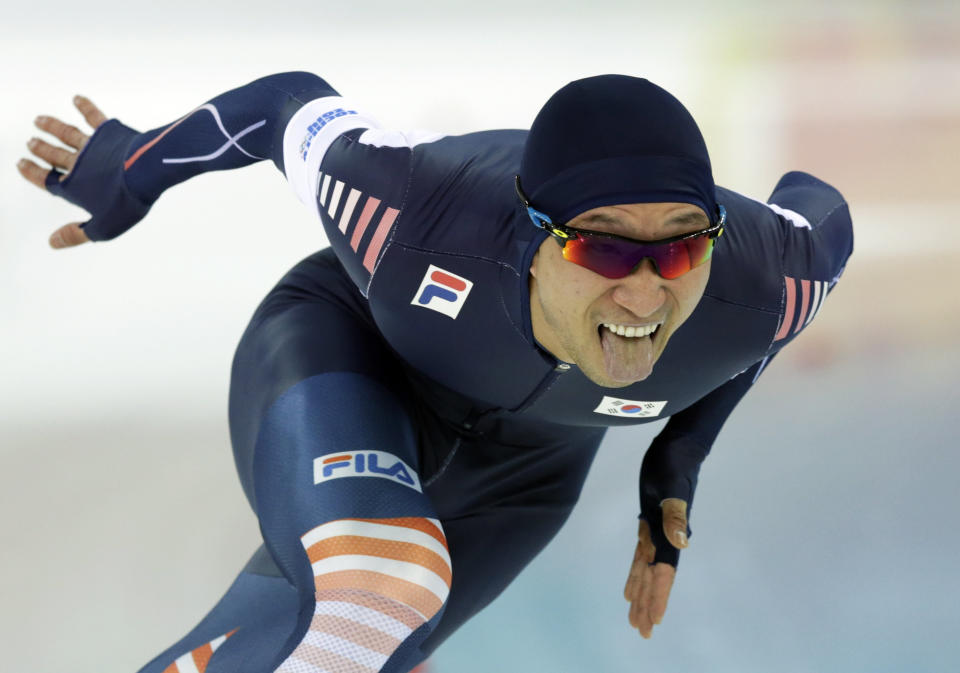 South Korea's Lee Kyou-hyuk competes during the second heat of the men's 500-meter speedskating race at the Adler Arena Skating Center at the 2014 Winter Olympics, Monday, Feb. 10, 2014, in Sochi, Russia.