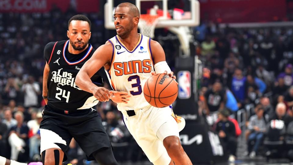 Phoenix Suns guard Chris Paul (3) moves the ball ahead of Los Angeles Clippers guard Norman Powell (24) during the first half in game four of the 2023 NBA playoffs at Crypto.com Arena