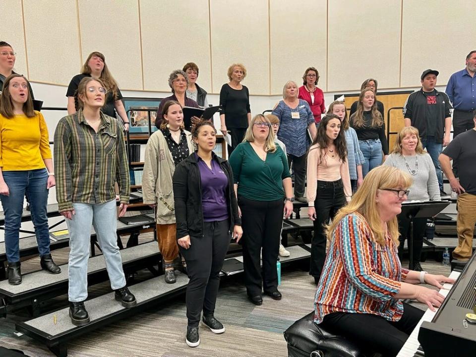 Accompanied by pianist Robyn Woodard, members of the Caliente Community Chorus' soprano section rehearse for their "Home" concert on March 21.