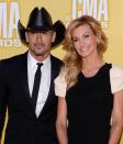 NASHVILLE, TN - NOVEMBER 01: (L-R) Country music artists Tim McGraw and Faith Hill attend the 46th annual CMA Awards at the Bridgestone Arena on November 1, 2012 in Nashville, Tennessee. (Photo by Jason Kempin/Getty Images)