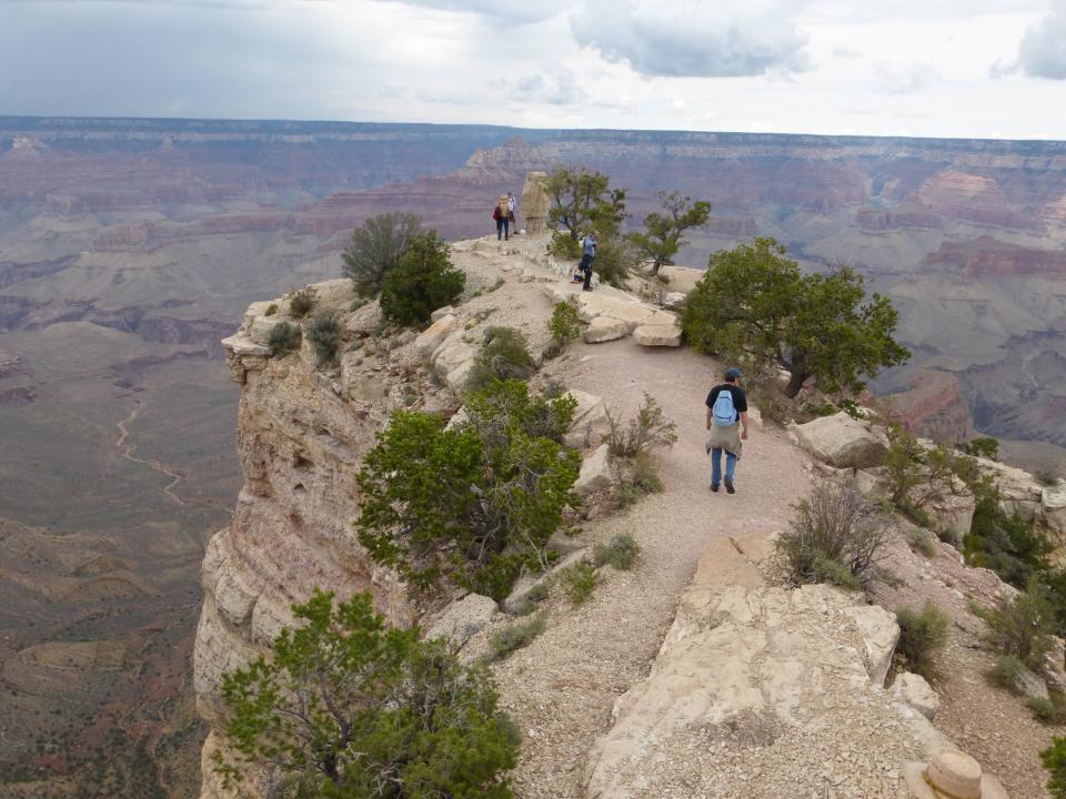 Shoshone Point, a peaceful spot along the South Rim of the Grand Canyon, is reached by an easy walk through the woods. It's popular for weddings and other events.