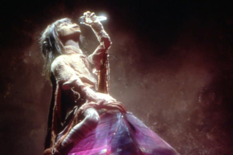 Jen locates "The Dark Crystal." Photo courtesy of Shout! Studios and The Jim Henson Company