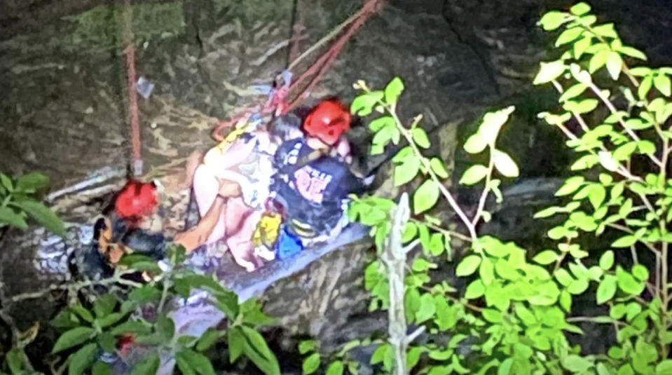 Rescuers from 18 separate agencies worked for hours to free a teenage hiker who had fallen 15m from a cliff (Gainesville Fire Department)