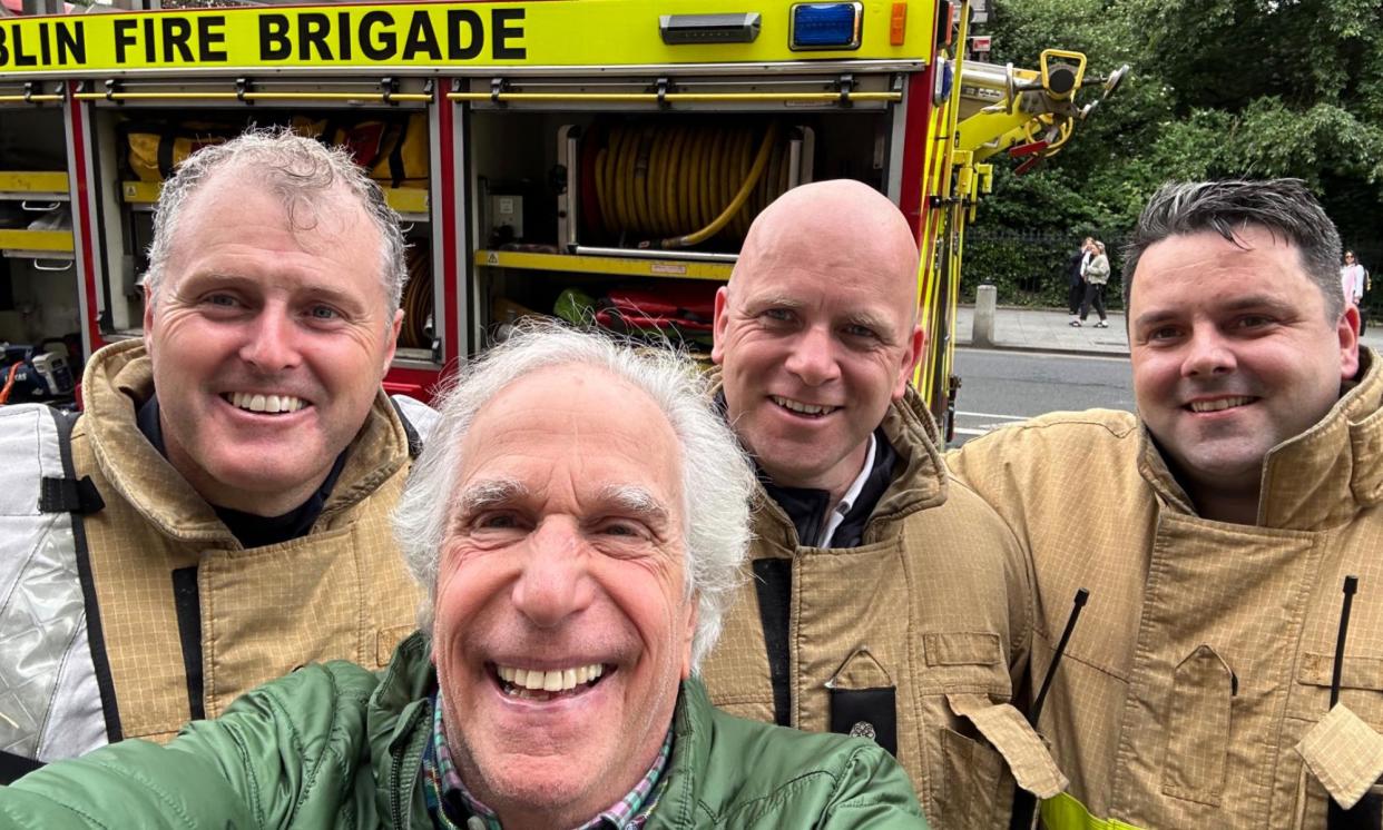 <span>Henry Winkler takes a selfie with firefighters outside the Sherbourne hotel in Dublin.</span><span>Photograph: Henry Winkler/X</span>