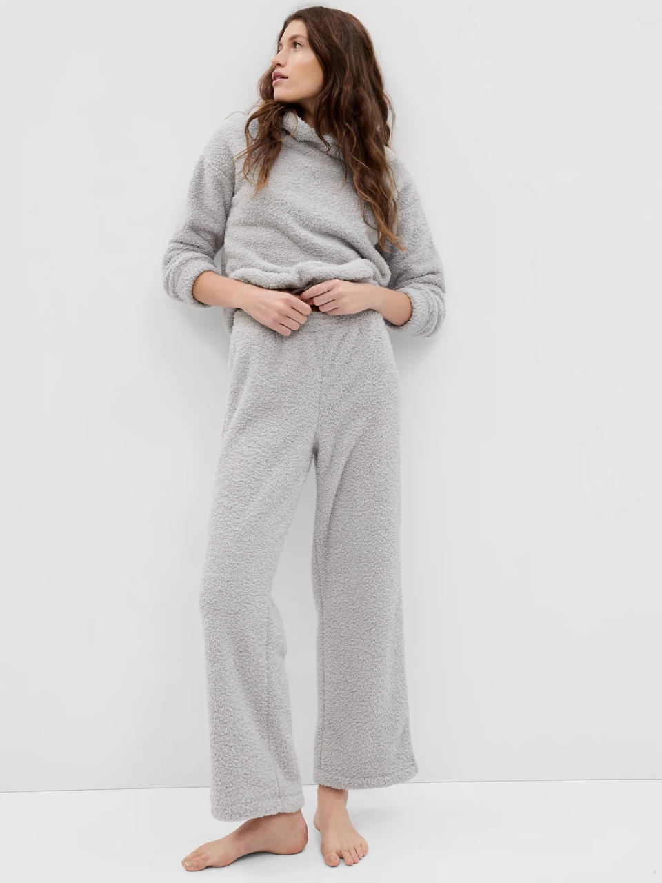 model wears grey Cozy Sherpa Pants. Image via Gap.