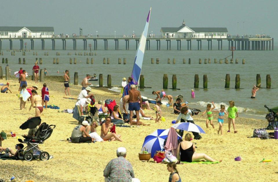 East Anglian Daily Times: People enjoying the sun at Southwold beach