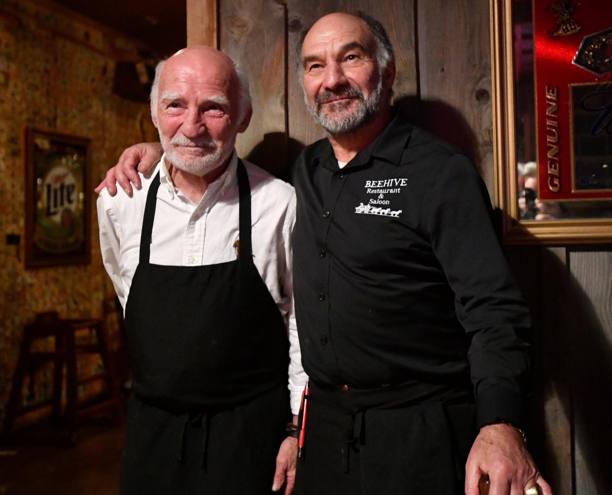 Ali Esfandiary (left) and his brother Nariman are applauded by patrons of their restaurant, the Fort Griffin General Merchandise and Beehive Saloon on its final day of business Jan. 28. The two Iranian brothers opened the restaurant in 1982, then a second one in Abilene in 2007. After 40 years, the Albany restaurant is closing as Ali and his wife retire.