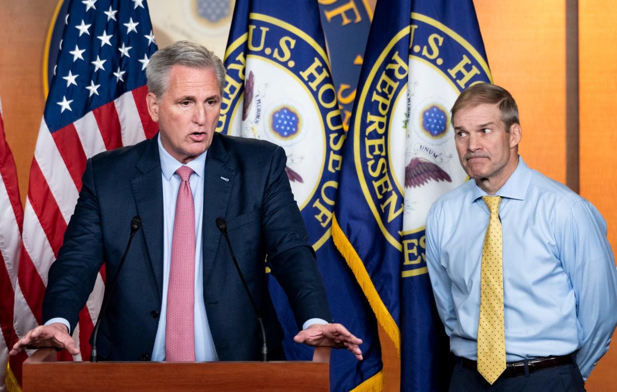 House Minority Leader Kevin McCarthy (left) speaks as Republican Rep. Jim Jordan of Ohio looks on during a Capitol Hill news conference on Wednesday, July 21, 2021 in Washington, DC.