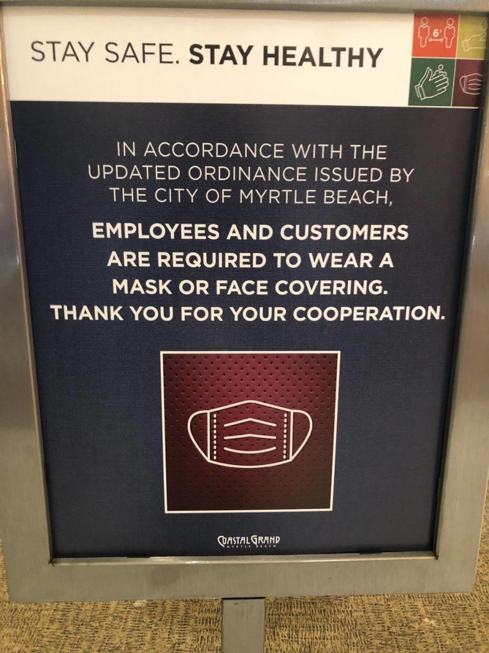 Though the city of Myrtle Beach did not extend a mandate requiring face masks inside public places on Wednesday, a sign remains in the Coastal Grand Mall on Thursday.