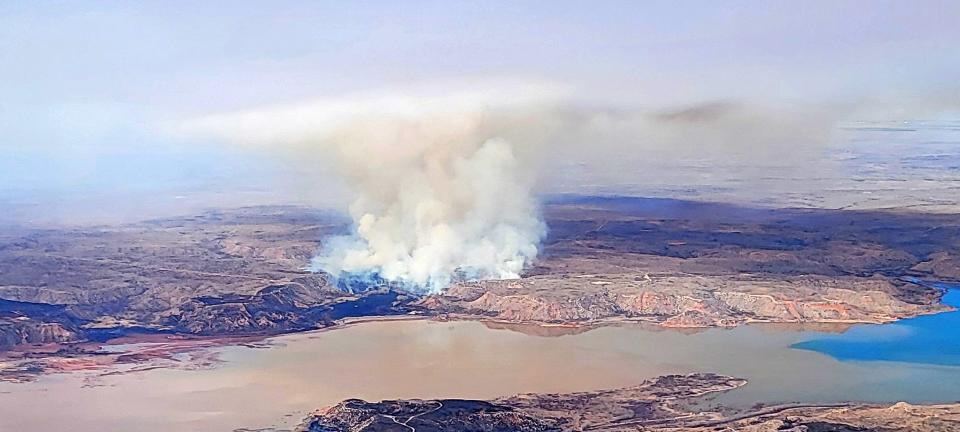 A large flareup next to Lake Meredith from the Windy Duece Fire could still be seen from the air as of Wednesday afternoon. As of Wednesday evening, the fire was an estimated 142,000 acres and 30 percent contained.