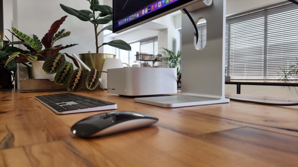 Mac Studio on wooden desk