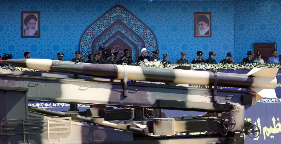 An Iranian medium range missile Zelzal passes by Iranian President Hassan Rouhani (C)   during the annual military parade marking the anniversary of the outbreak of its devastating 1980-1988 war with Saddam Hussein's Iraq, on September 22, 2017 in Tehran. Rouhani vowed that Iran would boost its ballistic missile capabilities despite criticism from the United States and also France. / AFP PHOTO / str        (Photo credit should read STR/AFP via Getty Images)