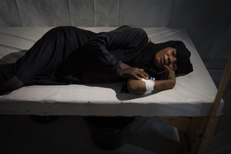 <p>Al Thawra Hospital, Al Hudaydah, Yemen, April 15, 2017: A suspected cholera patient lies on a wooden bed in a hospital in Al Hudaydah. The resurgent cholera outbreak, which started at the end of April, is spreading with unprecedented speed in Yemen. As of July 2017, 250,000 suspected cholera cases have been recorded, leading to 1800 deaths, in 19 of the country’s 22 governorates. The war is severely hampering access for critical medical supplies. (Photograph by Giles Clarke for UN OCHA/Getty Images) </p>