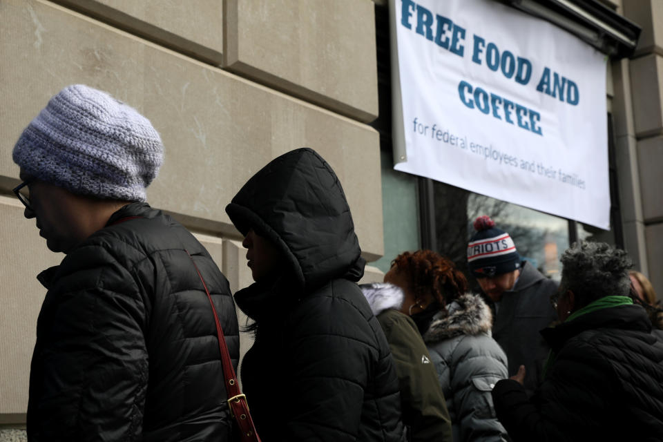 Federal workers left unpaid or furloughed by the extended partial government shutdown stand in line for fresh food and coffee at the World Central Kitchen, a volunteer emergency kitchen run by Chef Jose Andres, in Washington, Jan.16, 2019. (Photo: Jonathan Ernst/Reuters)