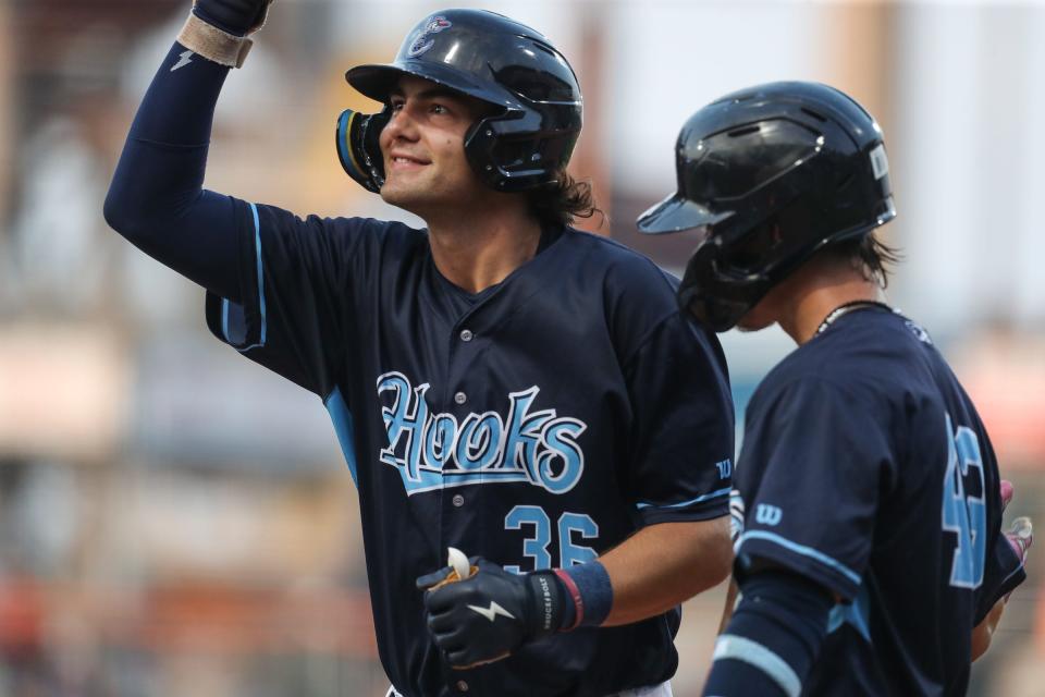 Hooks' Joey Loperfido celebrates hitting a home run during a homestand against the Sod Poodles at Whataburger Field on Thursday, June 22, 2023.