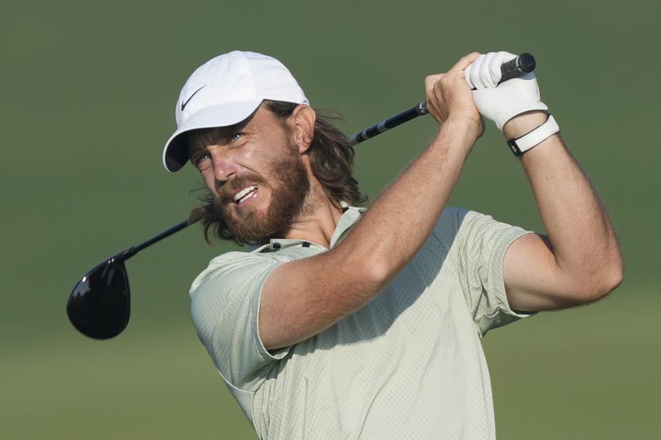 Tommy Fleetwood of England plays his second shot on the 10th hole during the second round of Dubai Invitational golf tournament, in Dubai, United Arab Emirates, Friday, Jan. 12, 2024. (AP Photo/Kamran Jebreili)