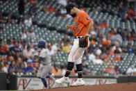 Houston Astros starting pitcher Jose Urquidy (65) kicks the mound as Toronto Blue Jays' Bo Bichette, back left, rounds the bases after hitting a solo home run during the first inning of baseball game, Friday, May 7, 2021, in Houston. (AP Photo/Eric Christian Smith)