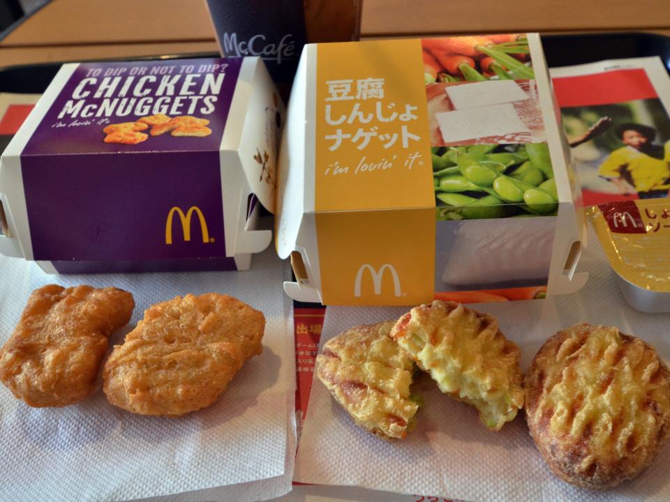 McDonald's Japan's new tofu products "Tofu Shinjo Nuggets" (R) and Chicken McNuggets (L) are displayed at a McDonald's restaurant in Tokyo on July 30, 2014.