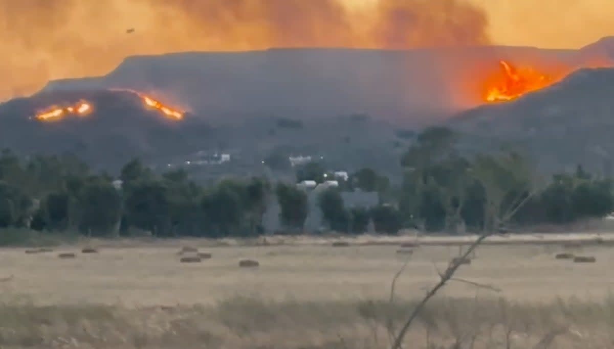 A view of fire around the island of Kos, Greece on Monday (Via REUTERS)