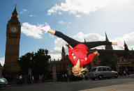 LONDON, ENGLAND - SEPTEMBER 13: Gymnast Nastia Liukin of the USA poses in front of Big Ben and the Houses of Parliament during a tour of London on September 13, 2011 in London, England. (Photo by Bryn Lennon/Getty Images for USOC)